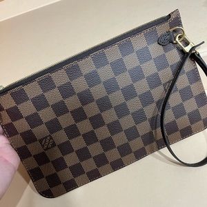 Brand new louis vuitton wristlet.